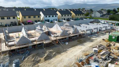 Construction site with houses under development using insulated concrete form (ICF) blocks.