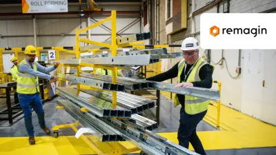 Workers in safety vests inspecting materials on yellow shelving in an industrial warehouse with Remainly logo.