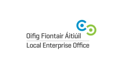 Logo of Oifig Fiontair Áitiúil Local Enterprise Office with two green and blue circles