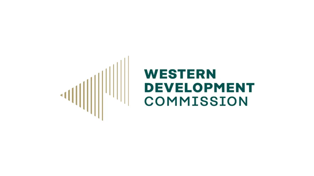 Logo of Western Development Corporation with a gold triangle design to the left.