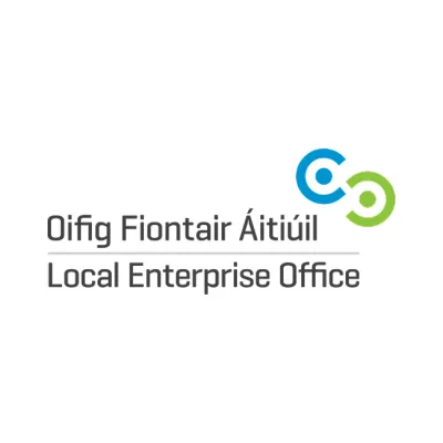 Logo of Oifig Fiontair Áitiúil Local Enterprise Office with two green and blue circles